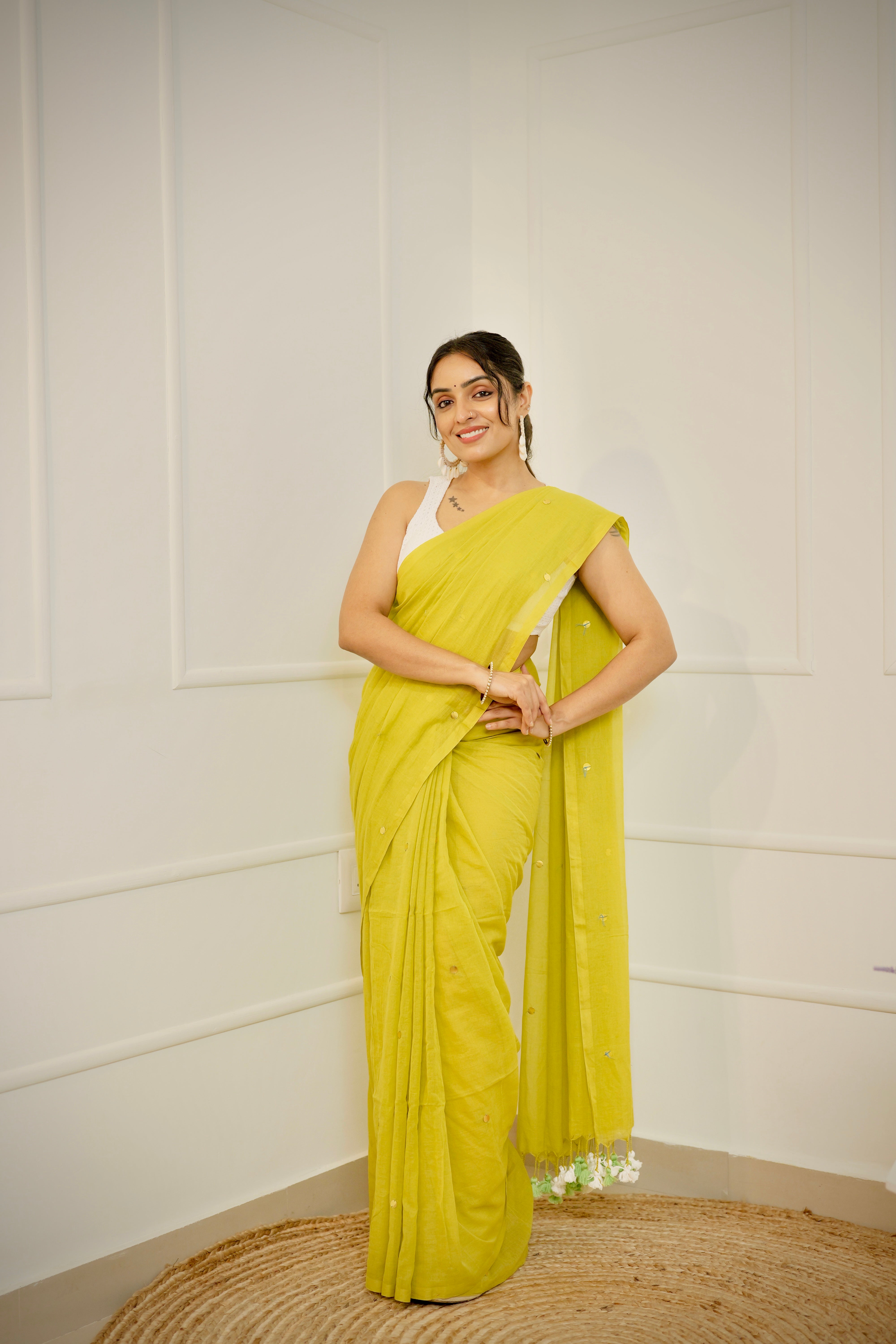 Vanalata – Warm Green Mul Cotton Saree with Round Sequins