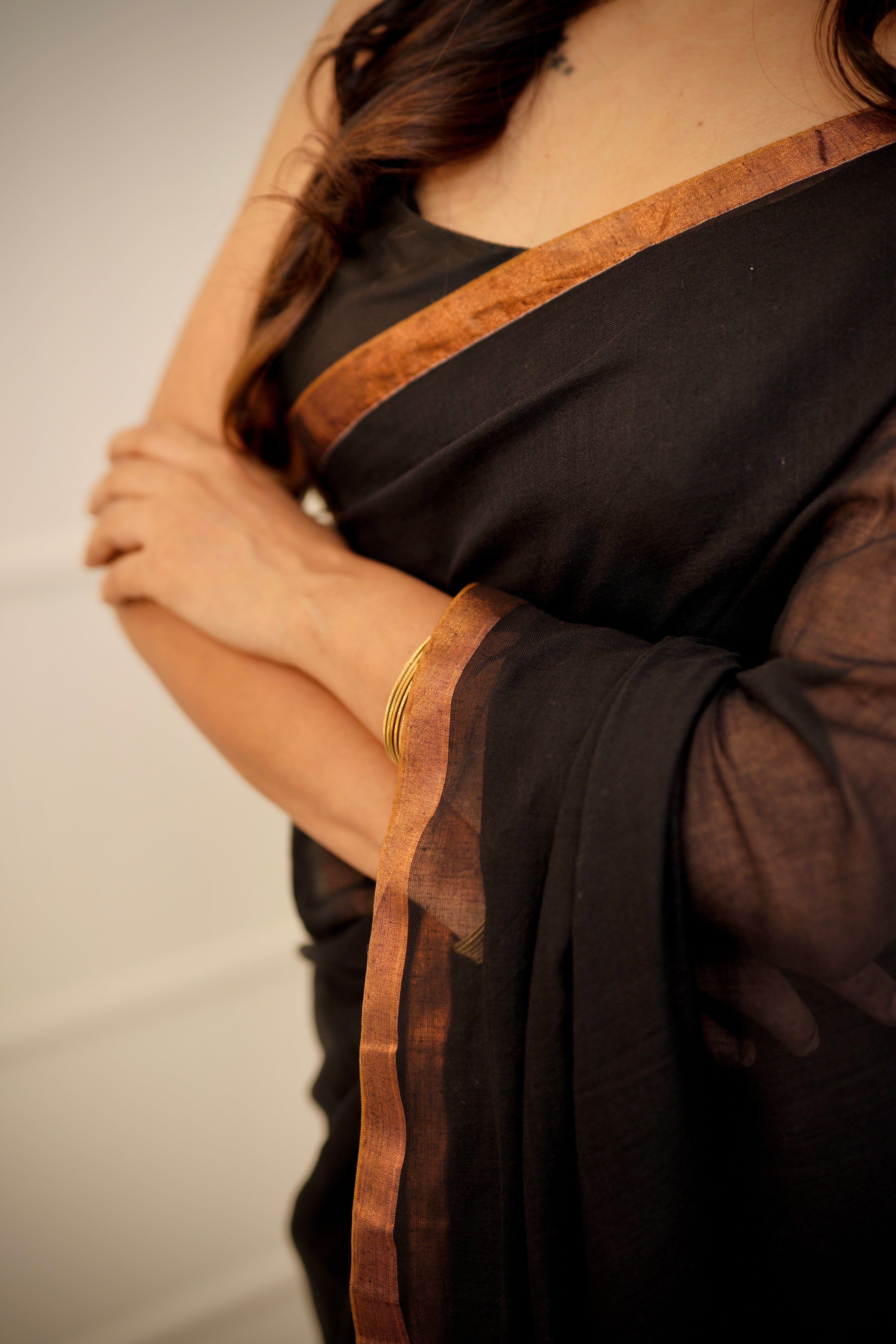 Maaya – Jet Black Mul Cotton Saree with Copper Zari Border