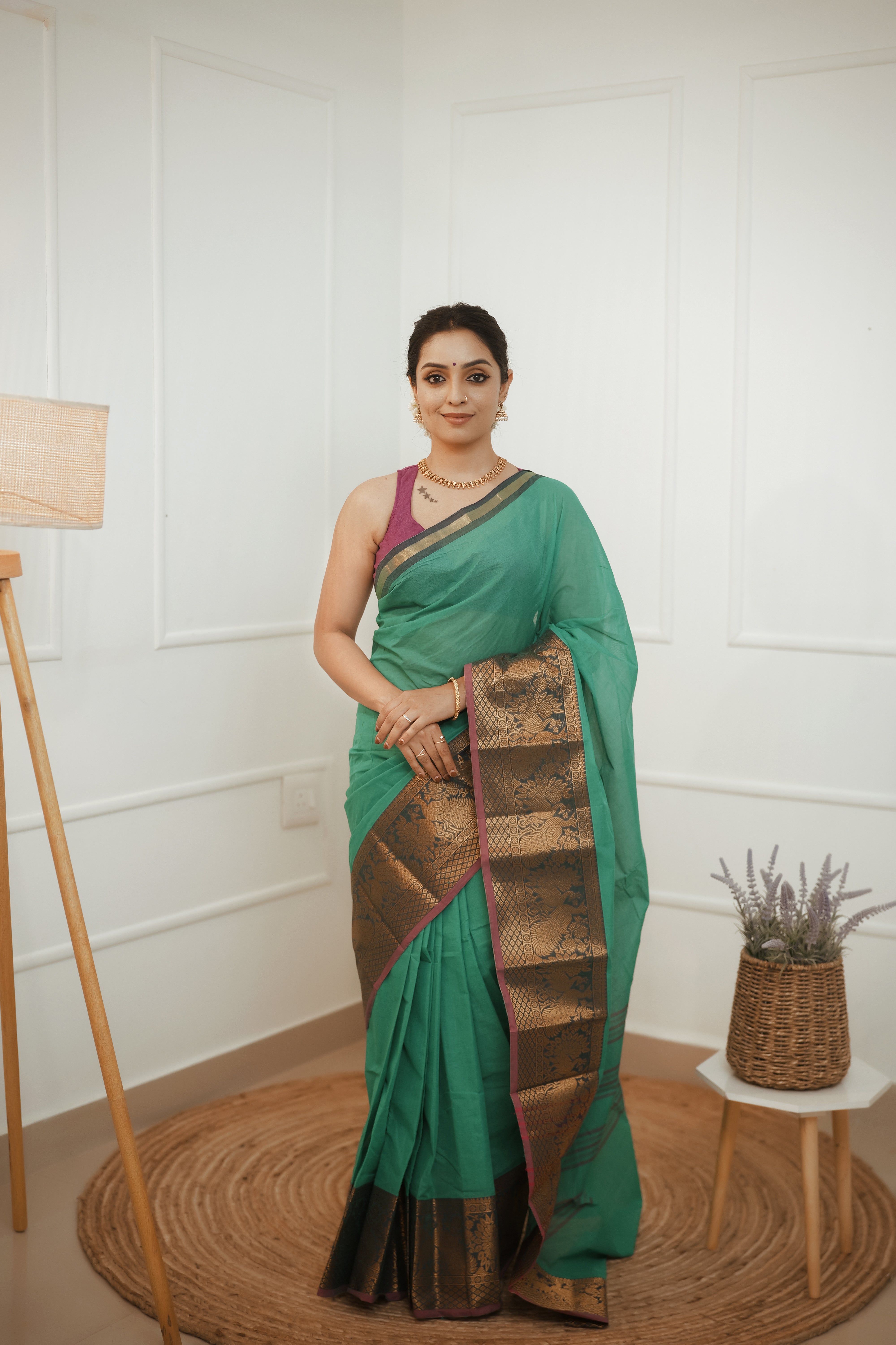 Nira – Emerald Green Cotton Saree with Antique Zari Border