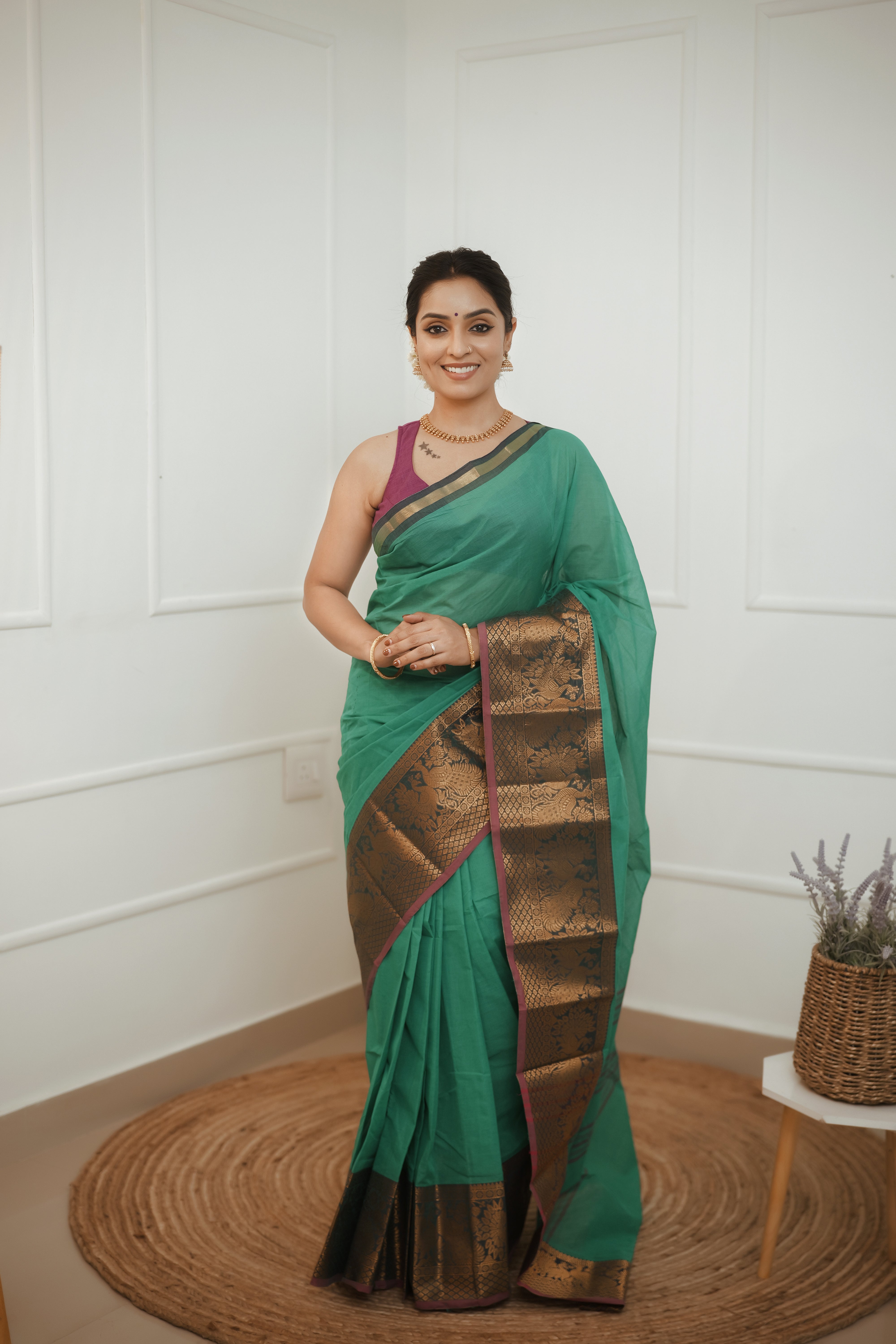 Nira – Emerald Green Cotton Saree with Antique Zari Border