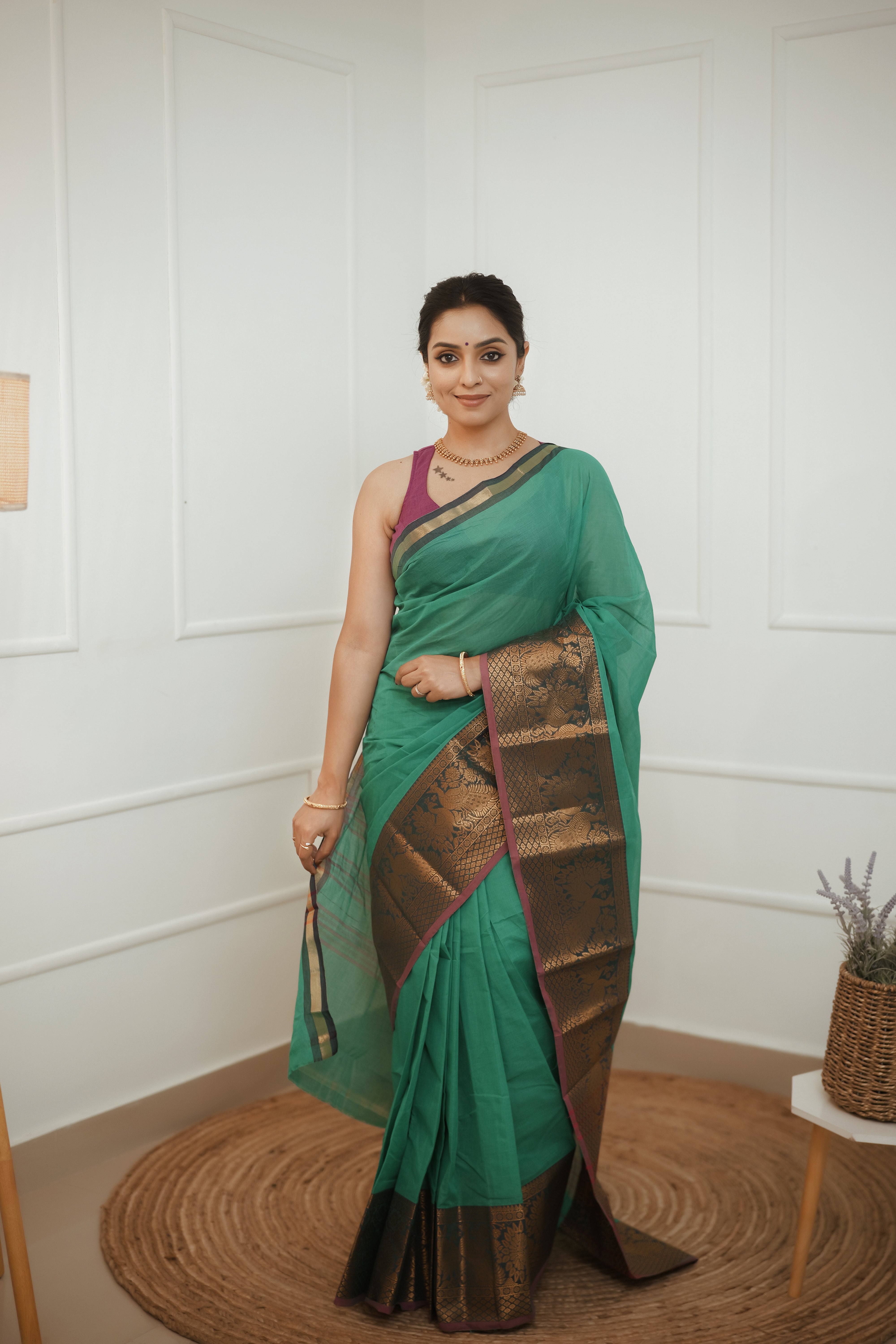Nira – Emerald Green Cotton Saree with Antique Zari Border