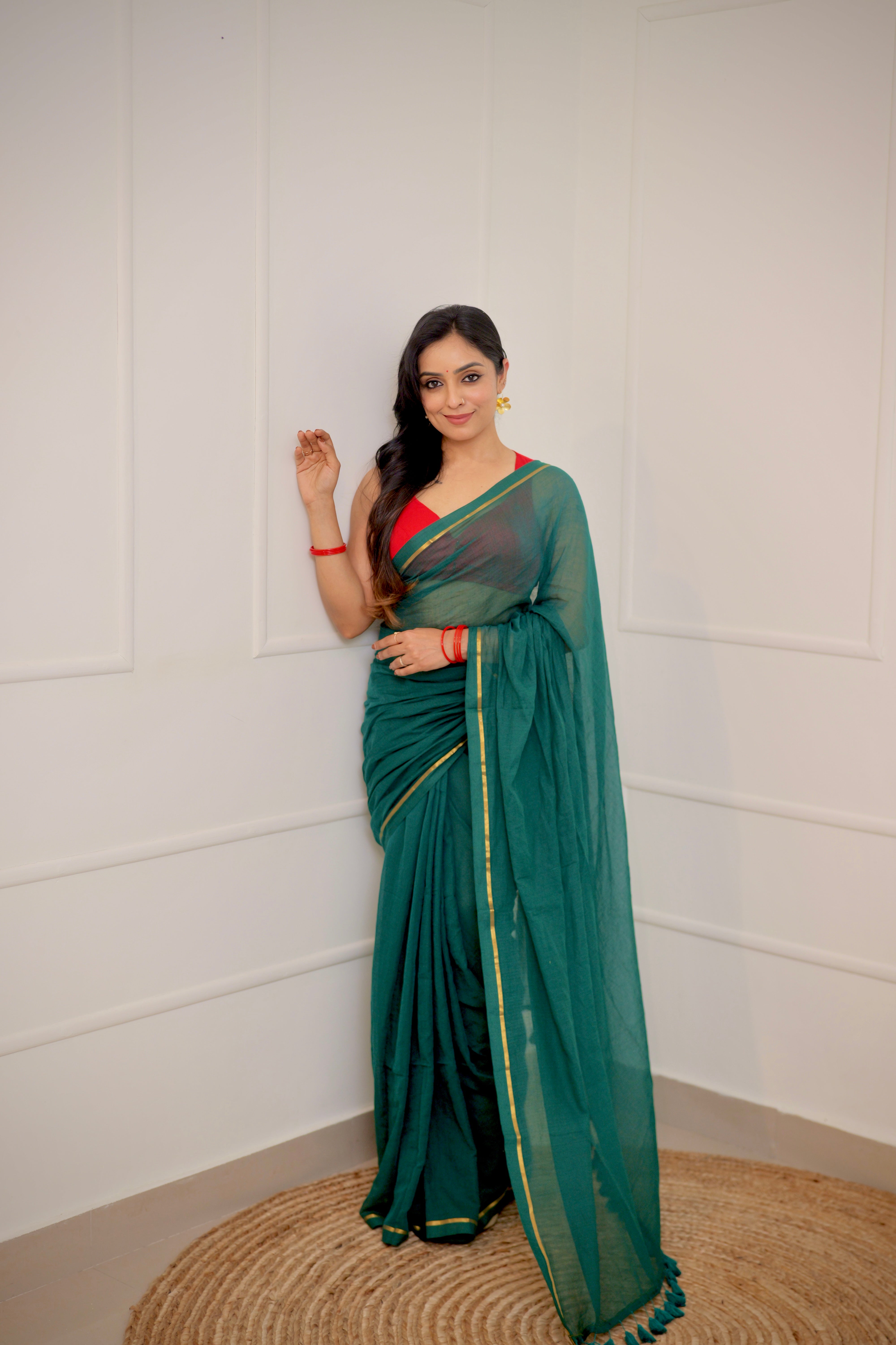 Haritha – Teal Green Mul Cotton Saree with Sleek Gold Zari Border