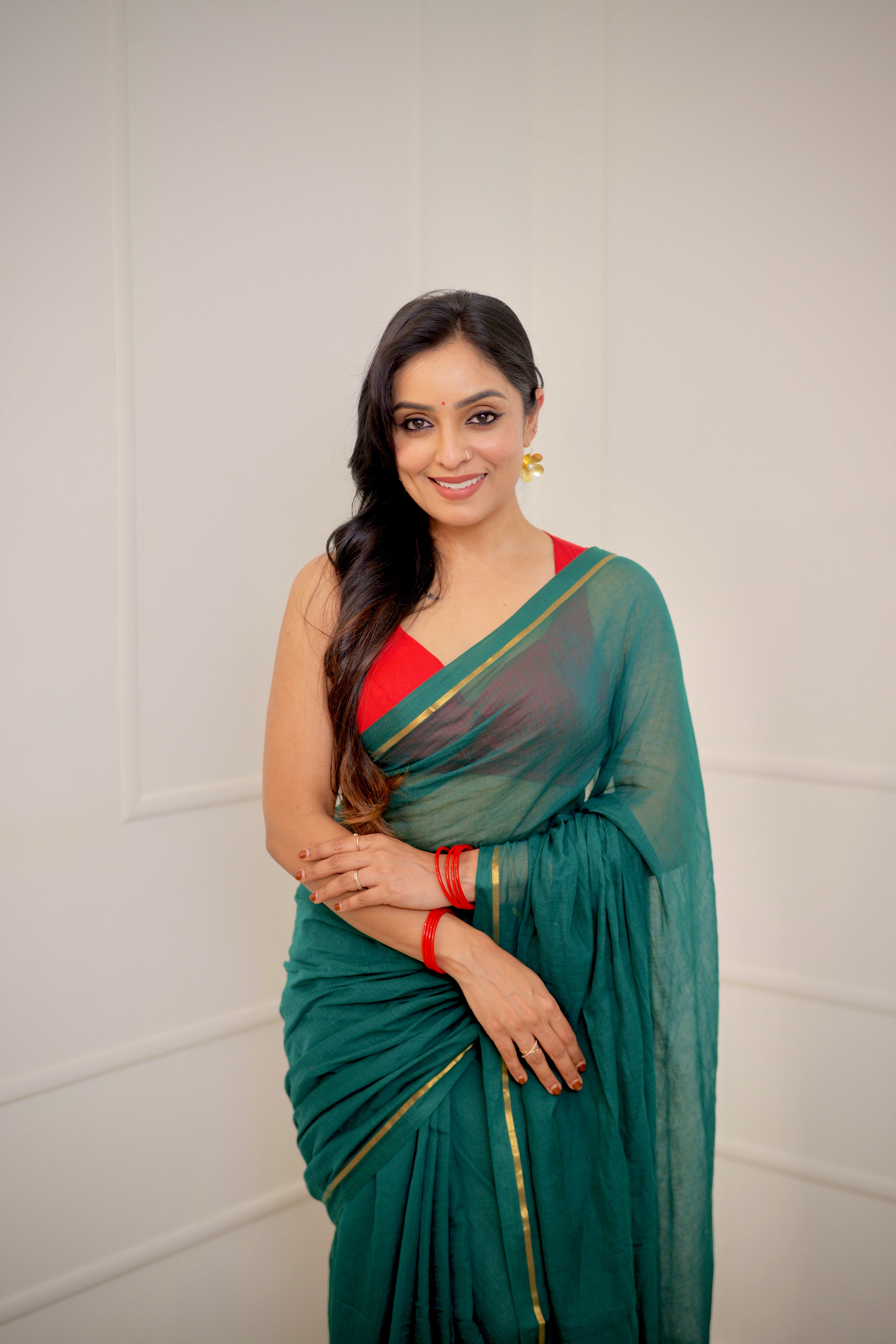 Haritha – Teal Green Mul Cotton Saree with Sleek Gold Zari Border