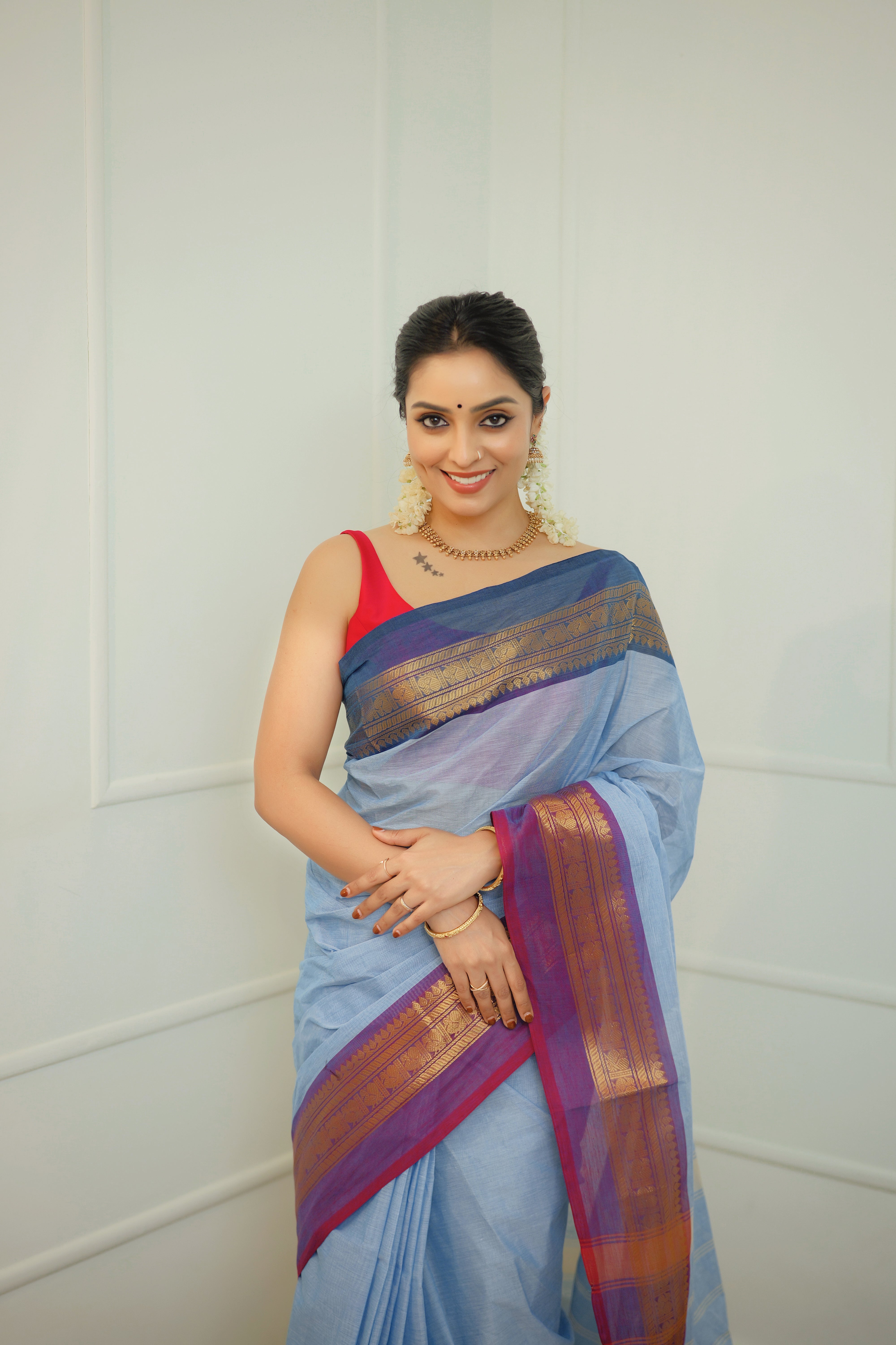 Neelambari – Powder Blue Handloom Chettinad Cotton Saree with Antique Zari Border