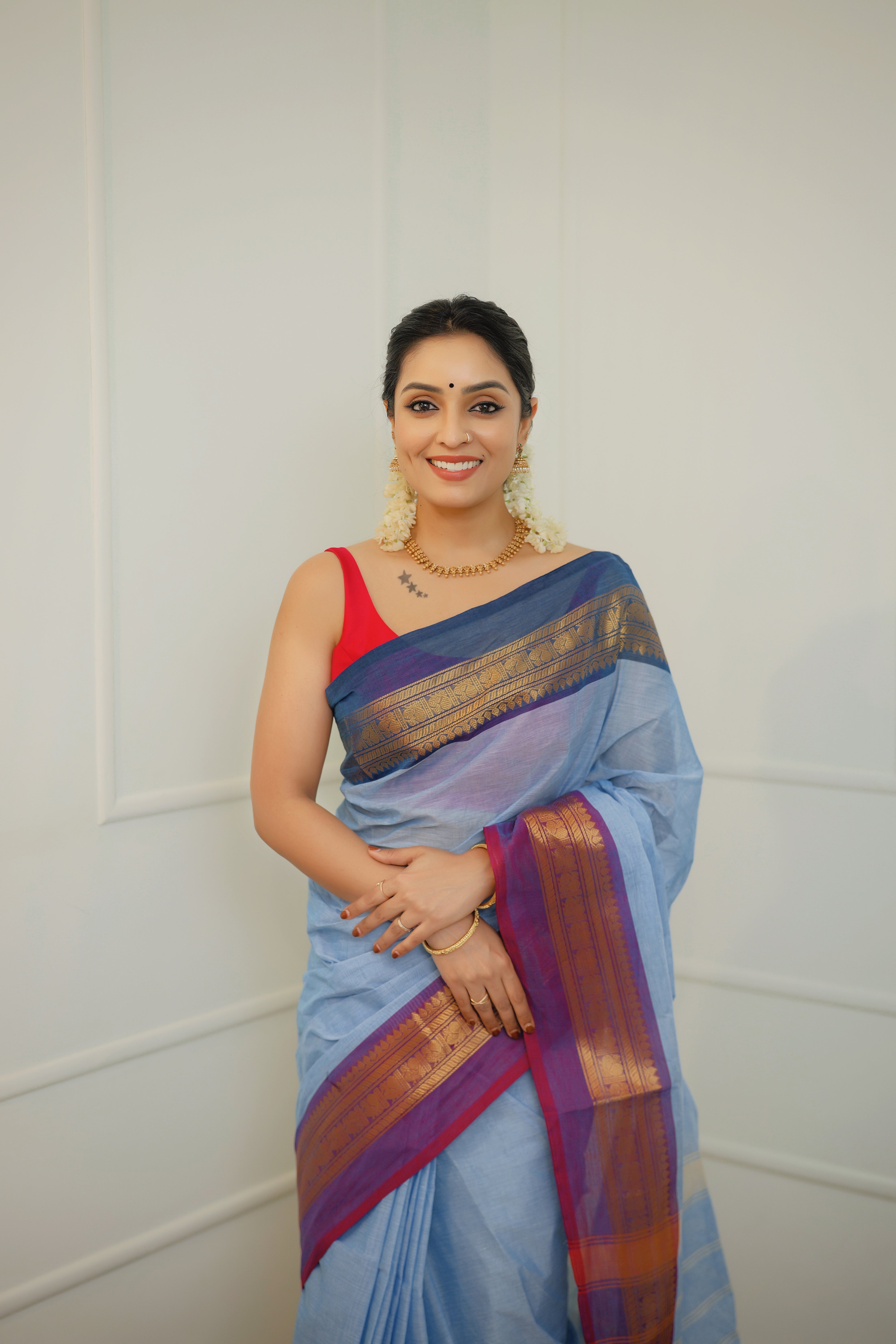 Neelambari – Powder Blue Handloom Chettinad Cotton Saree with Antique Zari Border