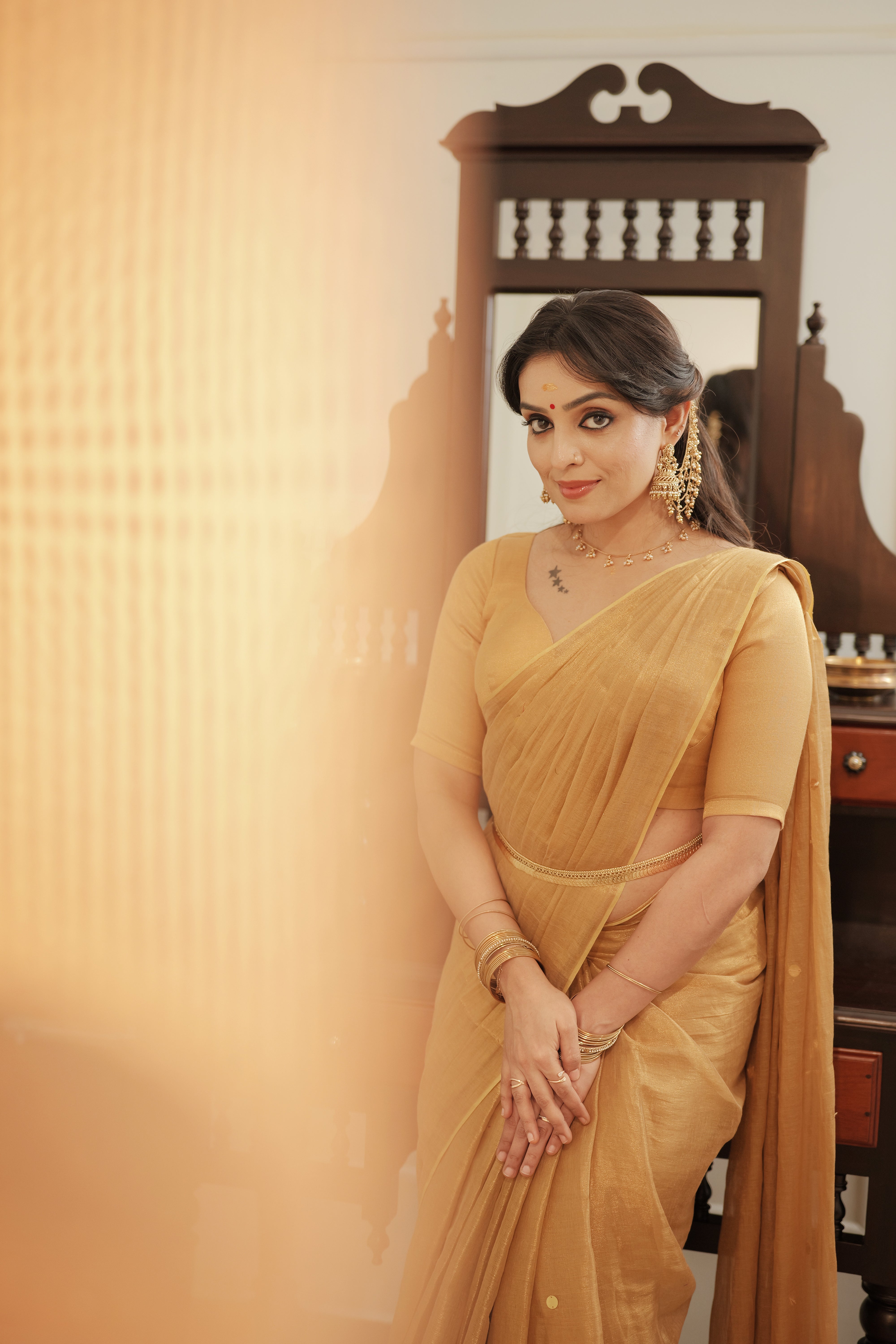 Naayika Suvarna – Golden Handloom Tissue Saree with Sequin Buttas