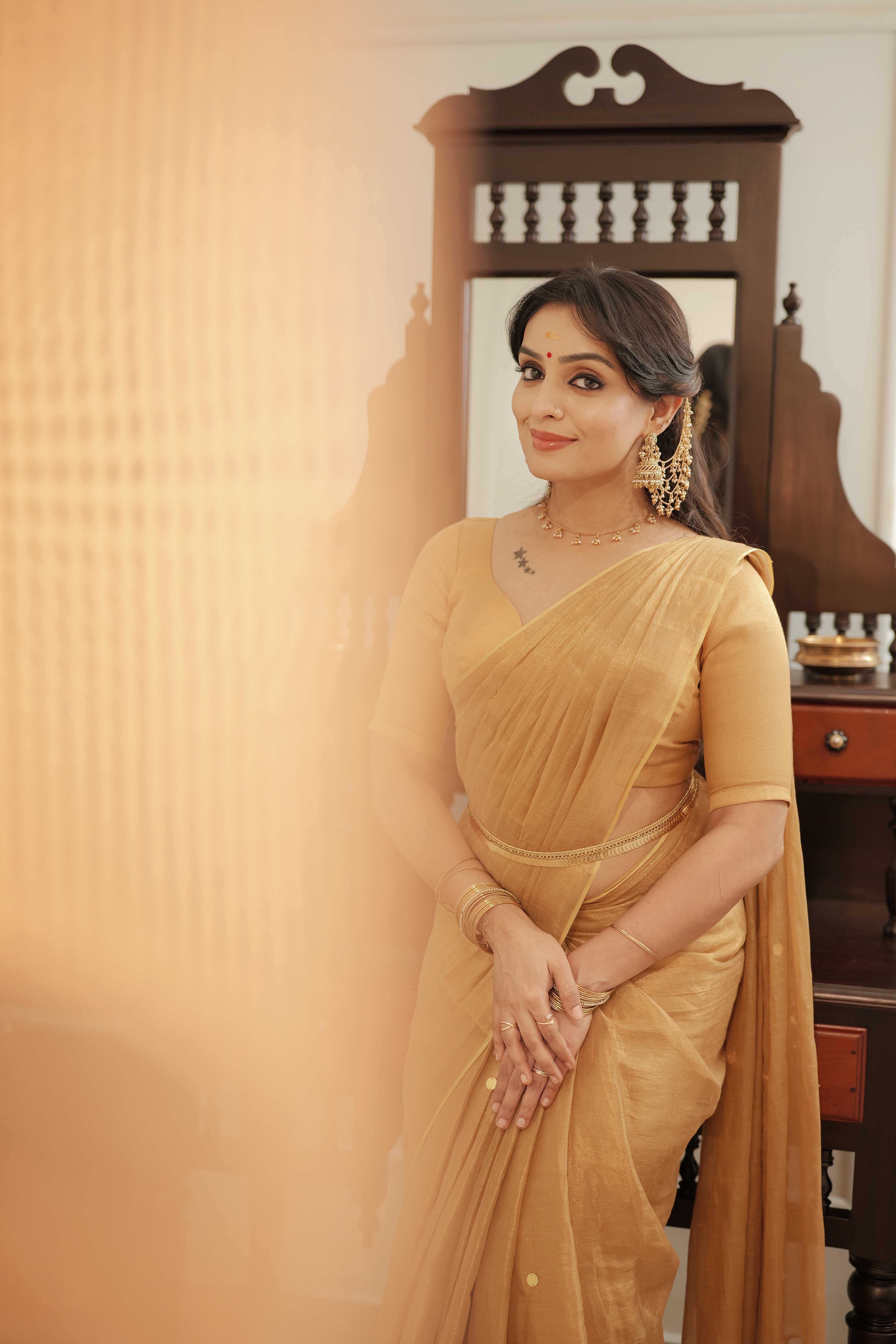 Naayika Suvarna – Golden Handloom Tissue Saree with Sequin Buttas