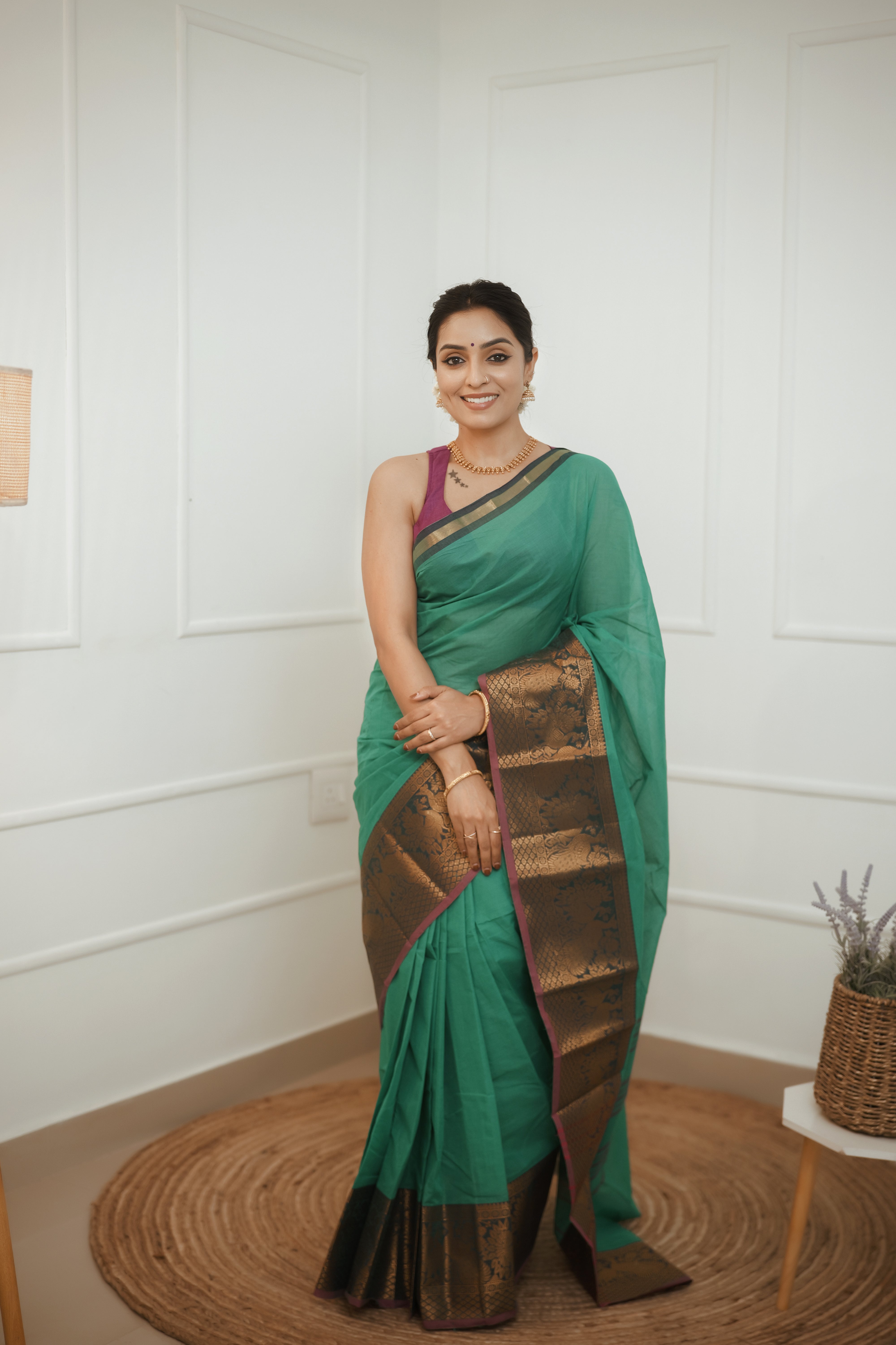 Nira – Emerald Green Cotton Saree with Antique Zari Border