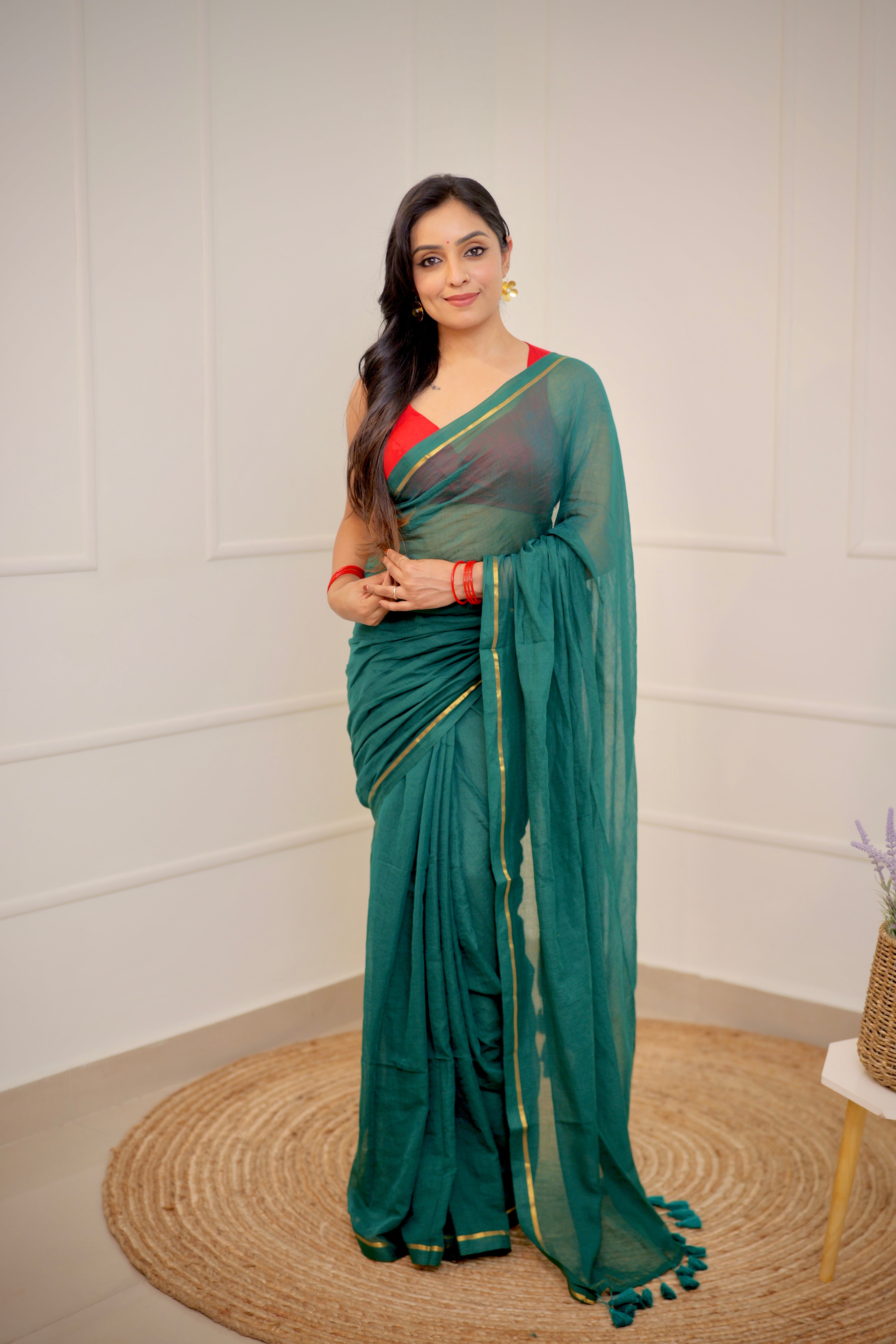 Haritha – Teal Green Mul Cotton Saree with Sleek Gold Zari Border