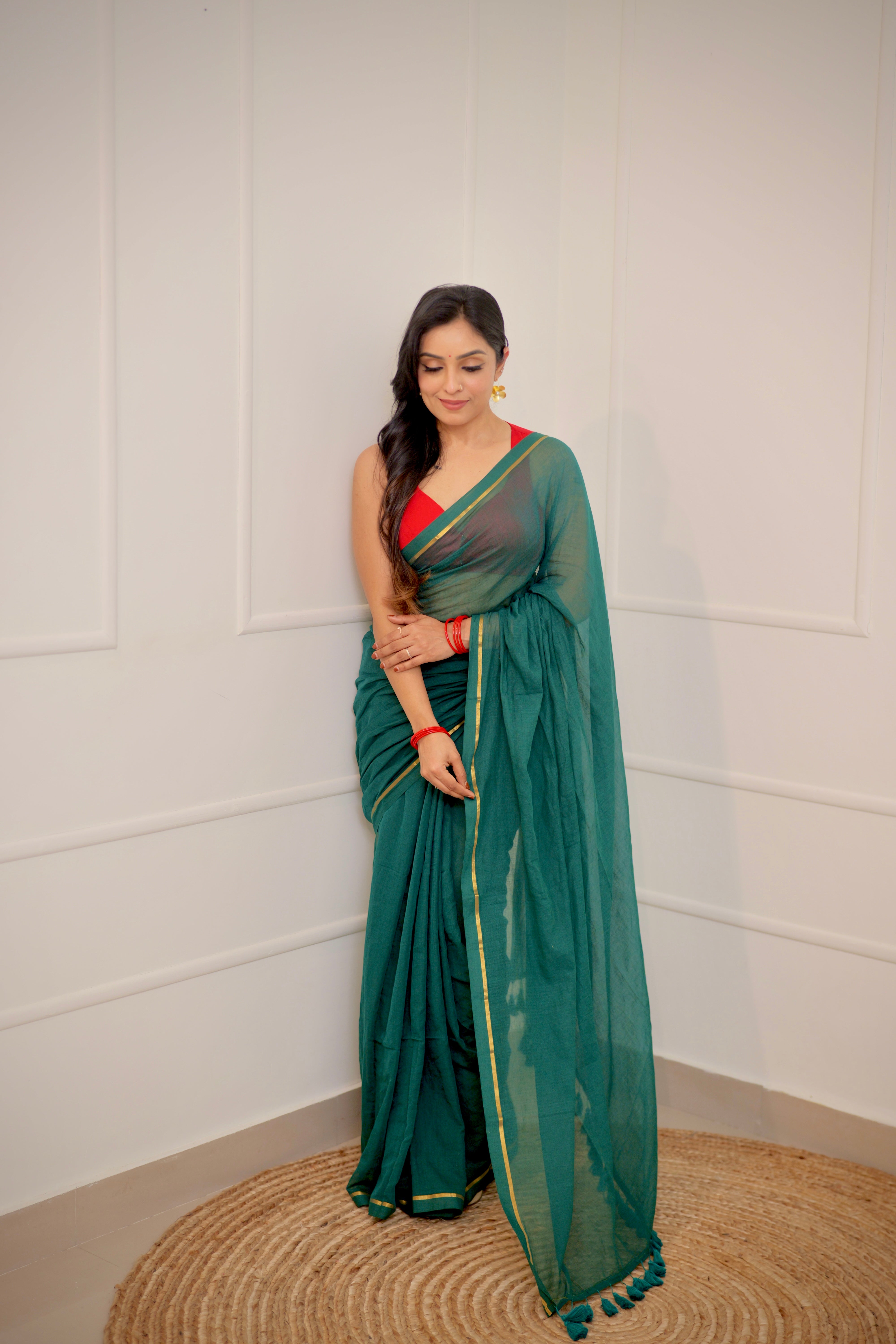 Haritha – Teal Green Mul Cotton Saree with Sleek Gold Zari Border