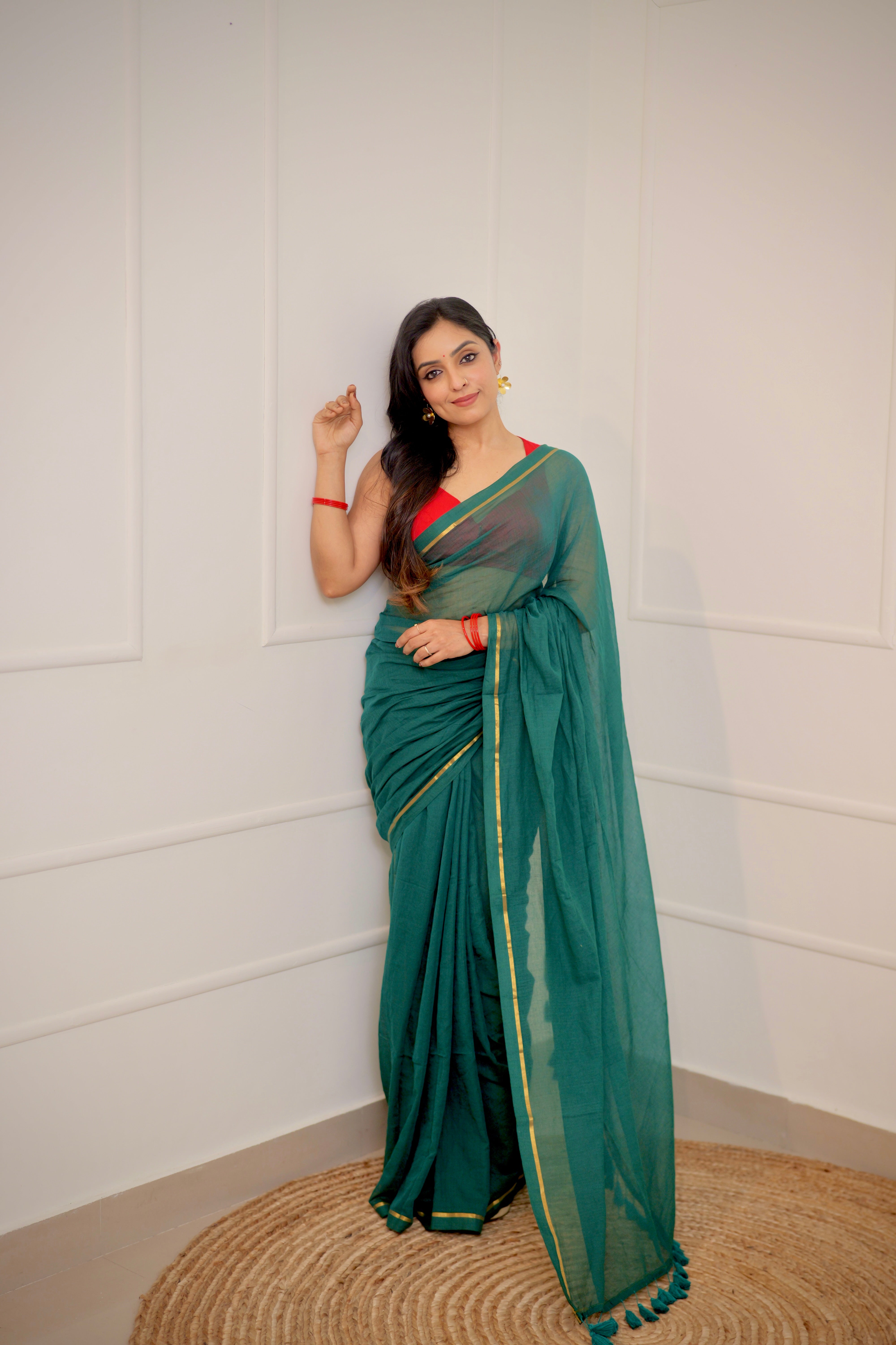 Haritha – Teal Green Mul Cotton Saree with Sleek Gold Zari Border